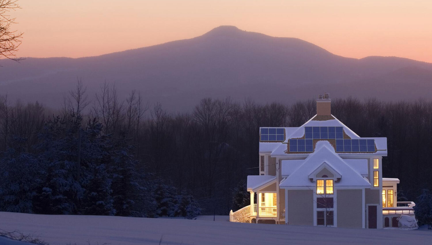A White Remote House Powered with 32 Solar Panels