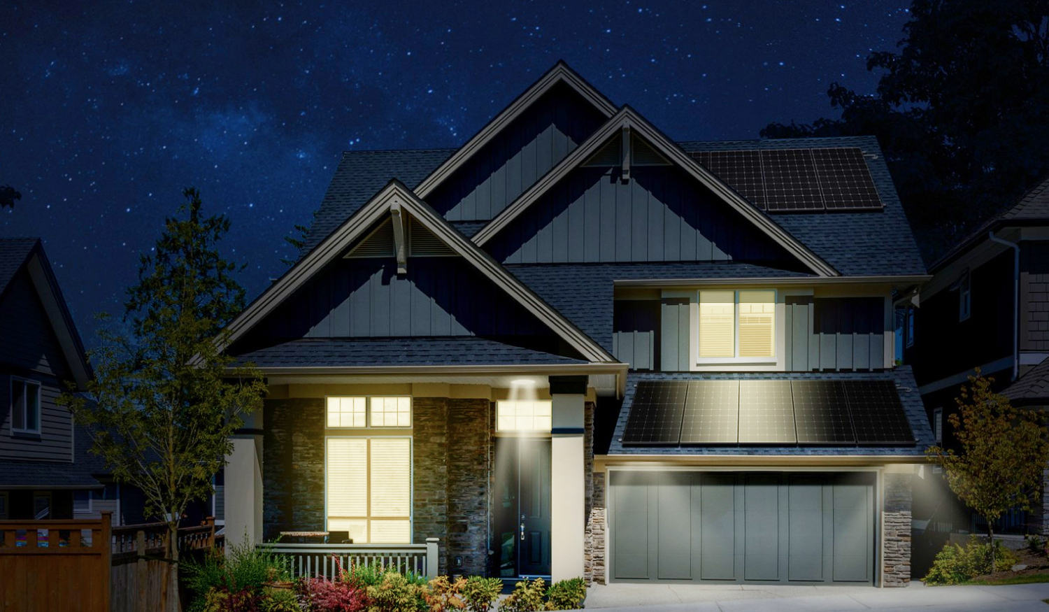 A Blue and White House from Outside View with Solar Panels at Night