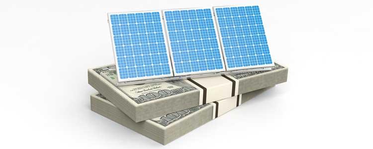 solar panels on stacks of money