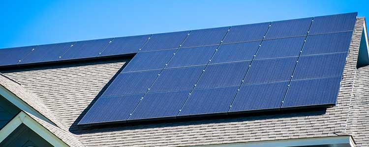 How do solar panels produce electricity?