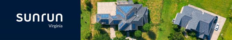 aerial shot of home with solar panels on roof